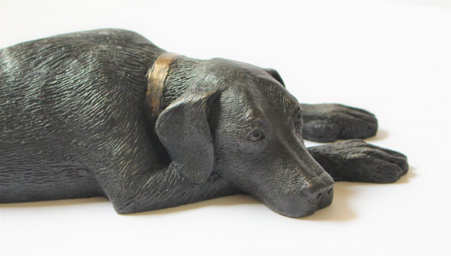 Bronze sculpture of a Labrador