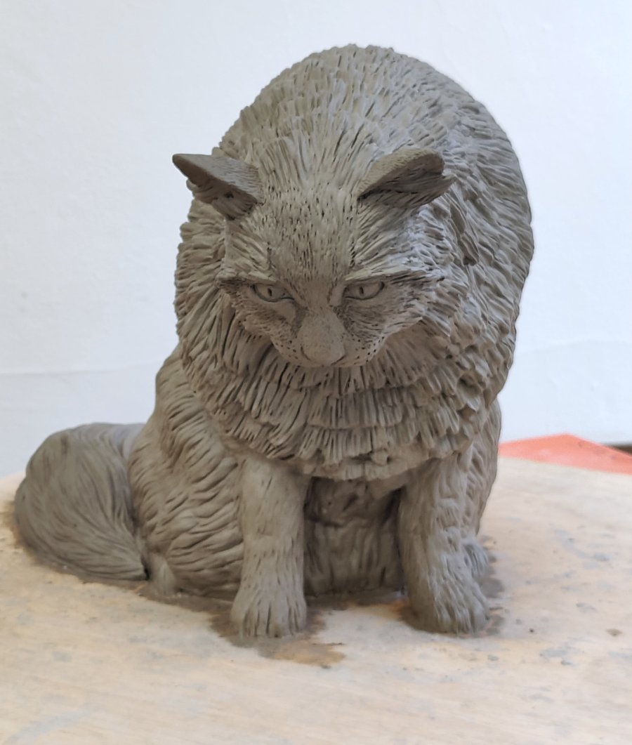 Clay sculpture of a cat