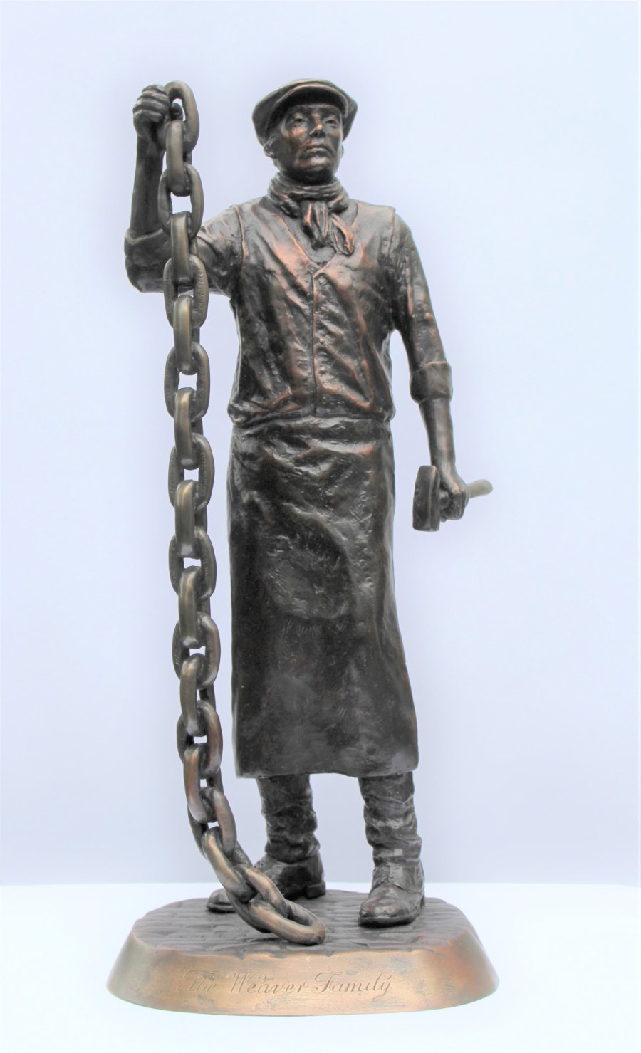 Chain Maker bronze sculpture