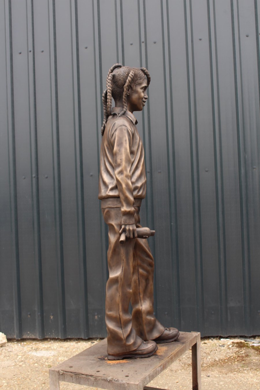 Side view of Ella Roberta Adoo-Kissi-Debrah bronze statue