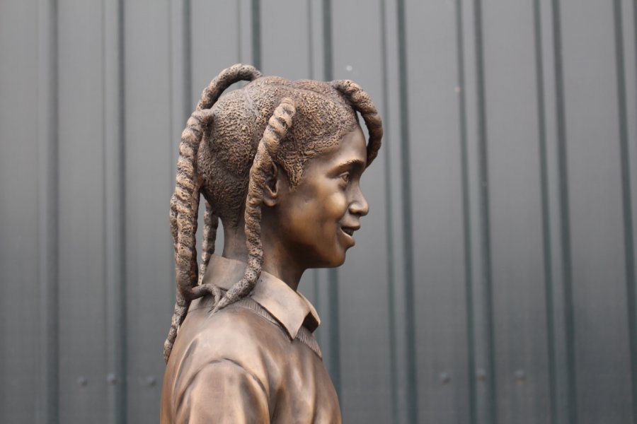 Profile view of Ella Roberta Adoo-Kissi-Debrah bronze statue