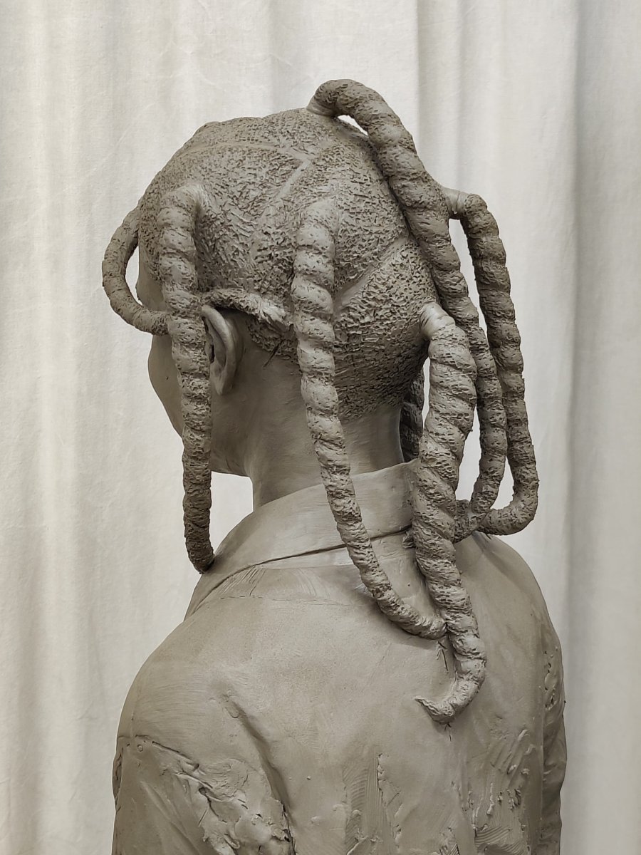 Close up of the hair and head of Ella Roberta Adoo-Kissi-Debrah clay sculpture