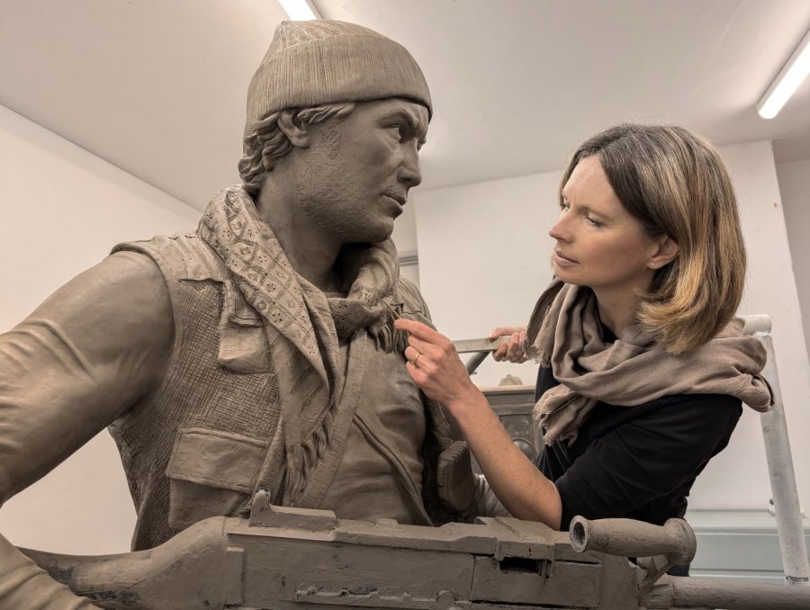 Hannah Stewart working on the clay of Life and a Quarter Bronze Sculpture