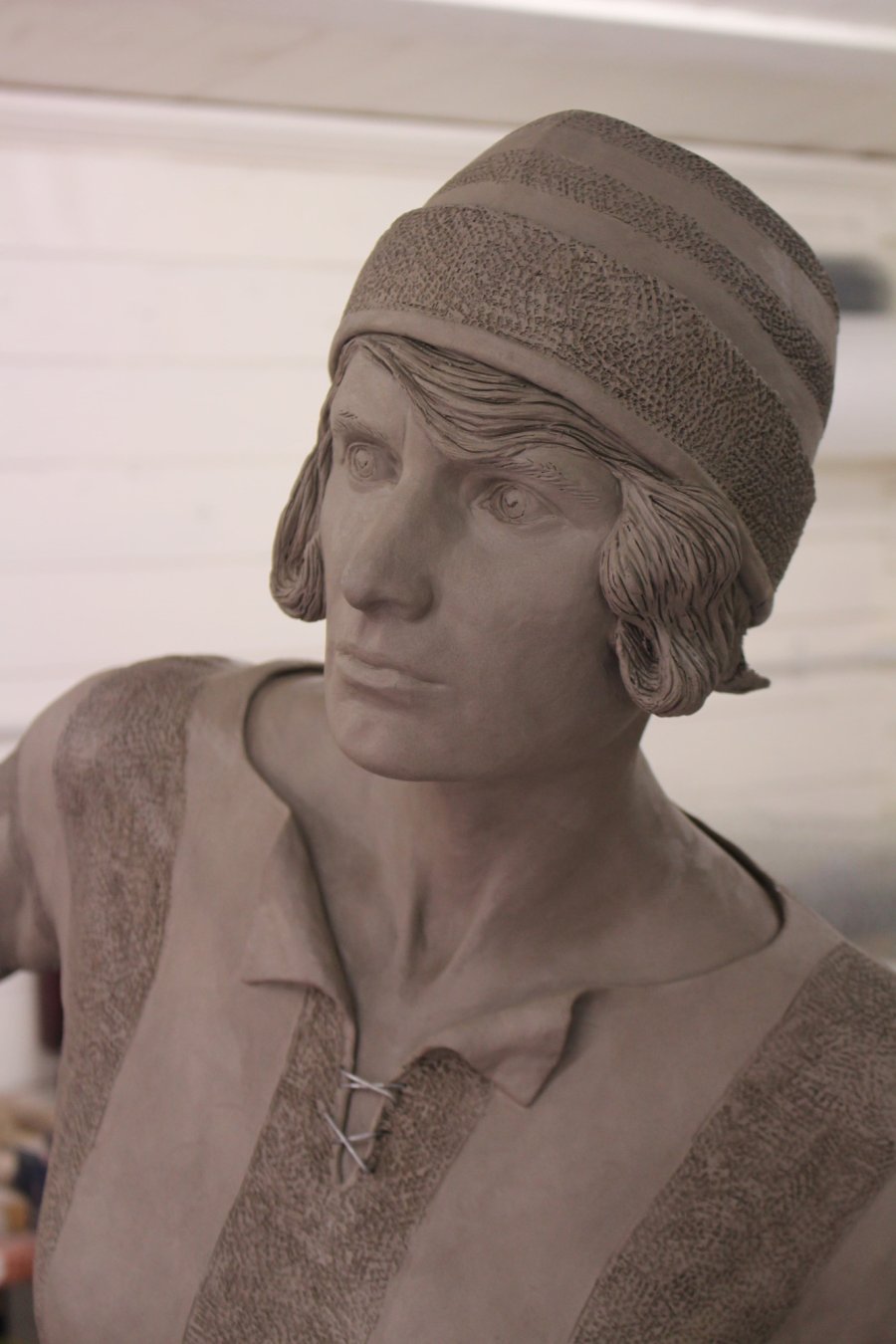 Clay sculpture upper body and head of Lily Parr
