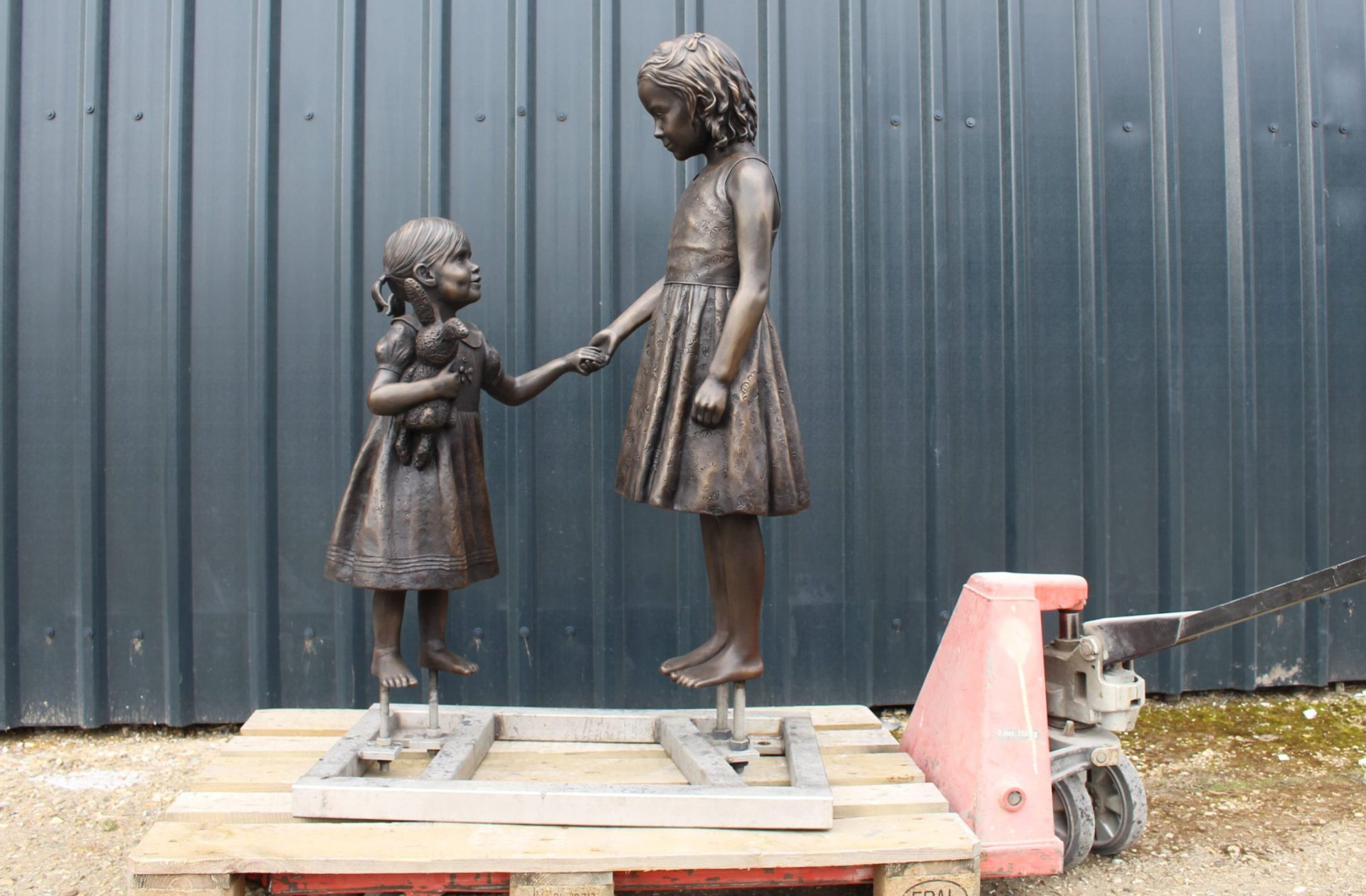 Two sisters bronze sculpture